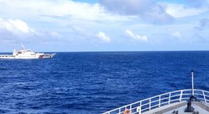 ILUSTRASI. KN Tanjung Datu milik Bakamla mengawasi kapal Coast Guard Tiongkok di Laut Natuna 19 Desember 2019. (BAKAMLA FOR JAWA POS)