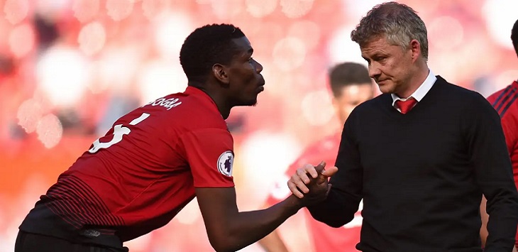 Ole Gunnar Solskjaer dan Paul Pogba.